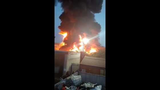 Intense scrapyard blaze sends huge flames and black smoke over Barnsley, UK