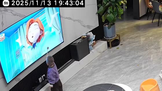 Toddler hammer damage to television in Henan, China