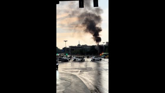 Vehicle erupts in flames at busy intersection in Xi'an, China
