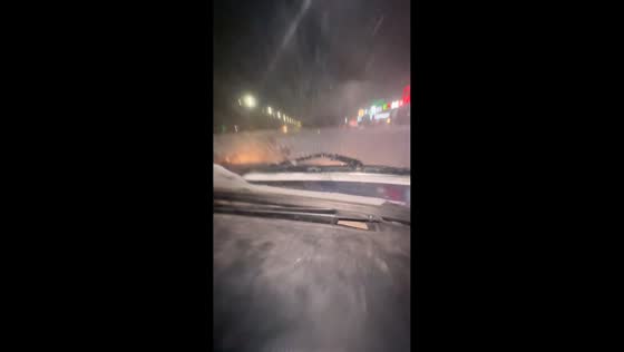 Car crashes into bench during snowy roads in Meppel, Netherlands