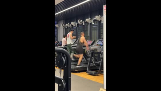Man runs with unusual arm posture on treadmill in Zhejiang, China