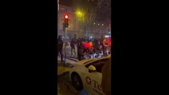 Police clash with protesters opposing Catalan separatist negotiations in Madrid