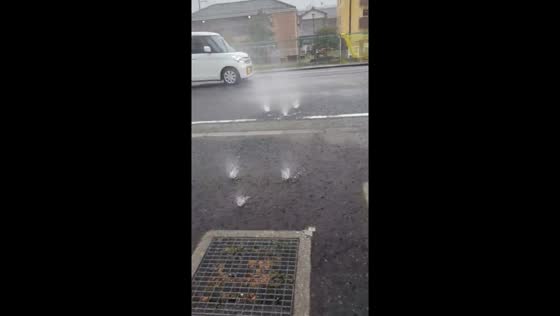 Heavy rain turns manholes into fountains in Chiba, Japan
