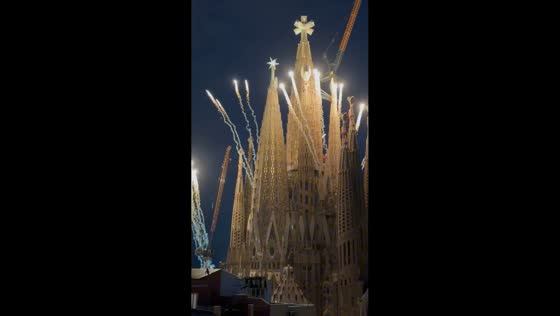 Drone light show and fireworks illuminate Sagrada Família during event in Barcelona, Spain