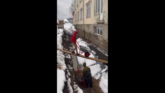Winter thrills: daring wheelbarrow adventure in Dovge, Ukraine