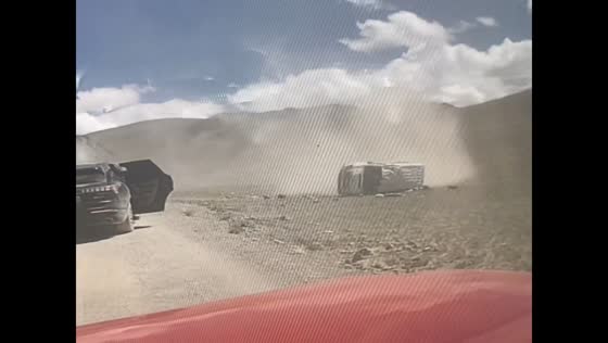 Van flips on rough road in Xizang, China