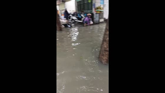 Severe flooding submerges motorcycles and inundates nearby establishments in Hainan, China