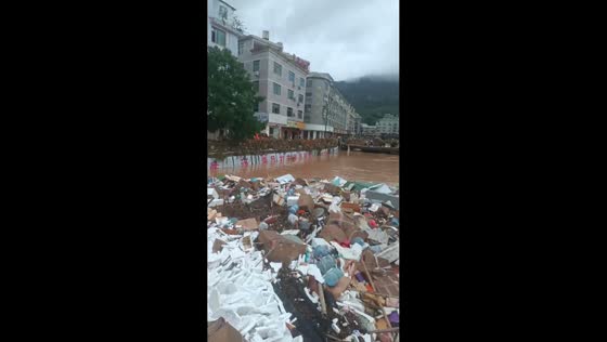 Severe floods sweep debris through urban streets in Fujian, China