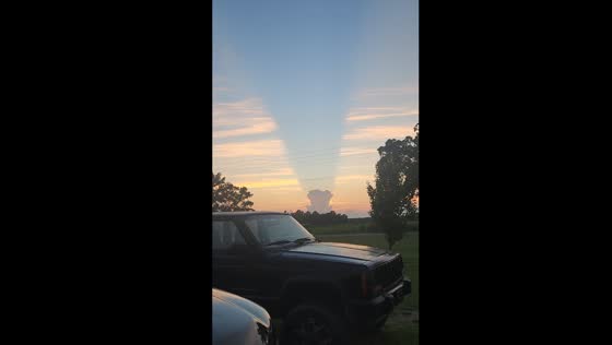 Clouds cast shadows over sunset in Albertson, New York