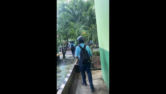 Student slips while walking at school in Lampung, Indonesia