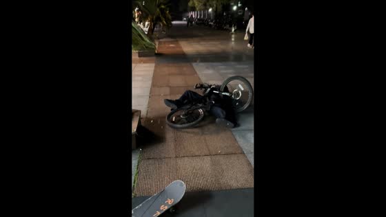 Man falls off bike after attempting a certain bike move in Hunan, China