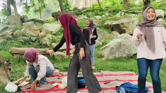 Cow disrupts picnic at Lembah Manah in Rembang, Central Java, Indonesia
