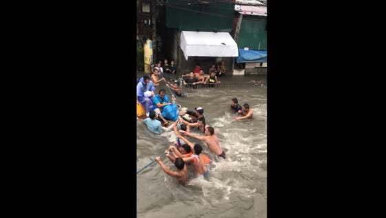 Rescue efforts in Catmon, Malabon during typhoon Gaemi floods