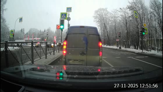 Police car struck during left turn at busy intersection in St. Petersburg, Russia
