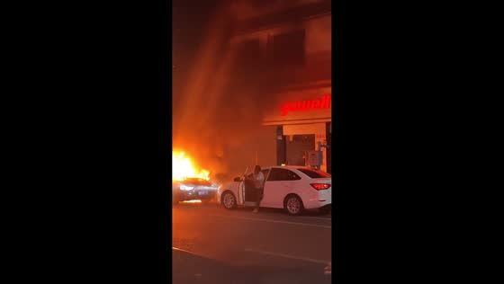BMW catches fire while parked roadside in Nanchong, Sichuan, China