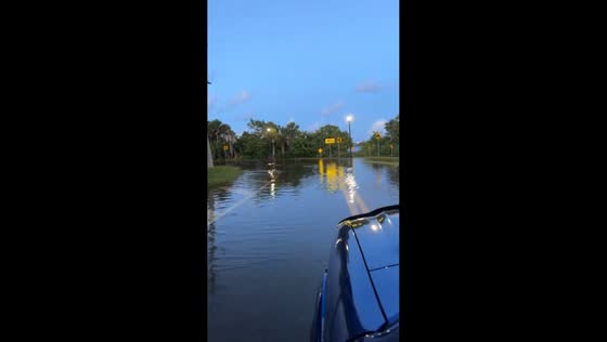 Roads submerged by king tide flooding along the river in Daytona Beach, USA