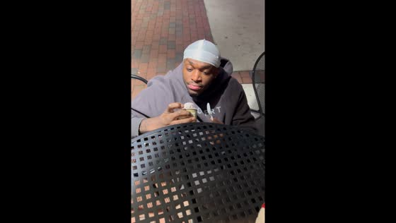 Person falls off chair but protects ice cream in Raleigh USA