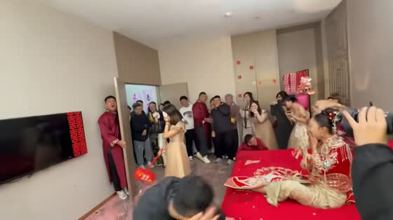 Bridesmaid accidentally hits wrong man during wedding door game in Liaoning, China