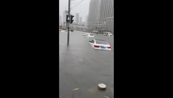 Flooded streets become an unexpected playground in Liaoning, China