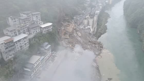 Massive landslide buries hillside neighborhood in Chongqing, China