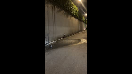 Isolated rain shower surprises Bangkok street, Thailand
