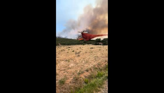 Aerial efforts to battle massive wildfire in Albas, France