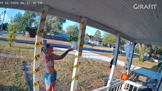 Woman repeatedly bumps her head on hanging plant in Clever, USA
