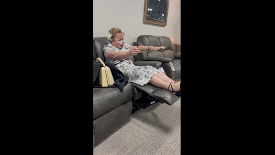 Hilarious sofa mishap at Lakeside Shopping Park as woman gets knocked over by recliner
