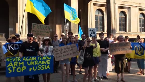 Protesters rally against Trump-Putin summit at American Embassy in Munich, Germany