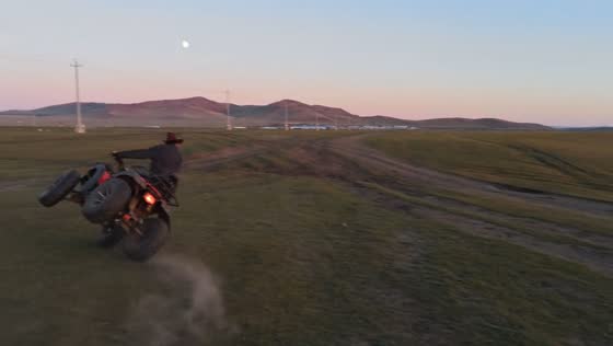 Quad bike tilts and rider falls in Inner Mongolia, China