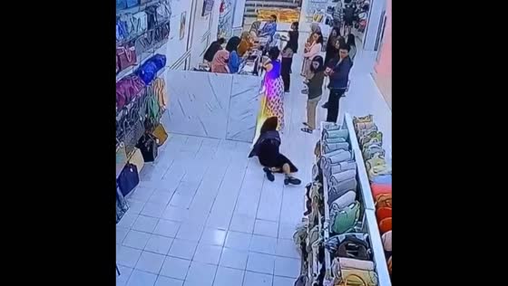 Lady slips and falls in store