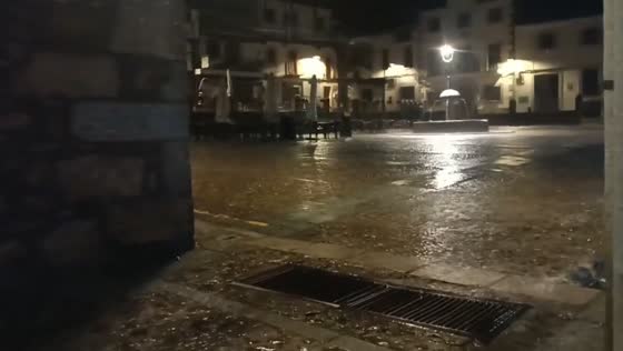 Intense heavy rain echoes through Cuacos de Yuste in Spain