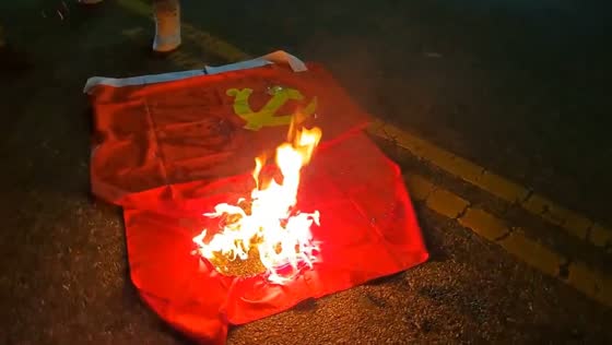 Protesters burn Chinese Communist Party flag outside LA Consulate