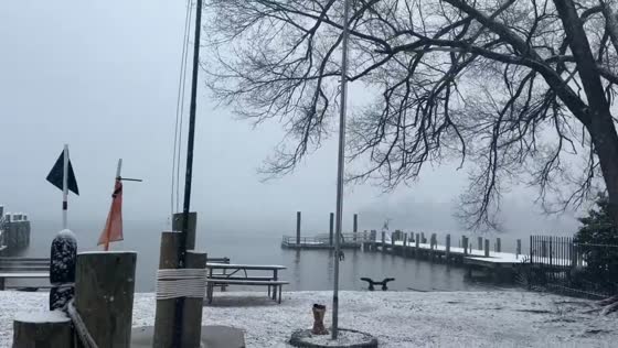 Snowfall scene as snow train rolls through in Baltimore, Maryland, USA