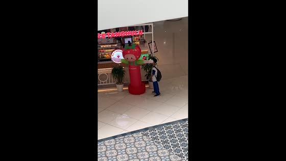 Boy embarrassed after enjoying inflatable standee slaps in Mall of Asia, Philippines