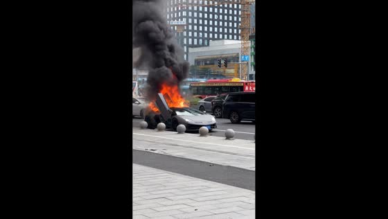 Lamborghini catches fire beside road in Guangzhou, Guangdong, China
