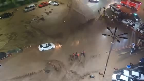 Firefighters rescue stranded occupants during flooding in Beijing, China