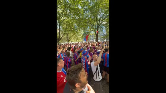 Thousands of Crystal Palace fans gather ahead of matchday march in Leipzig, Germany