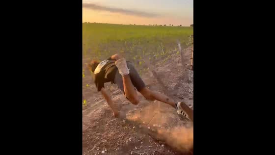Person falls over a fence in Spain