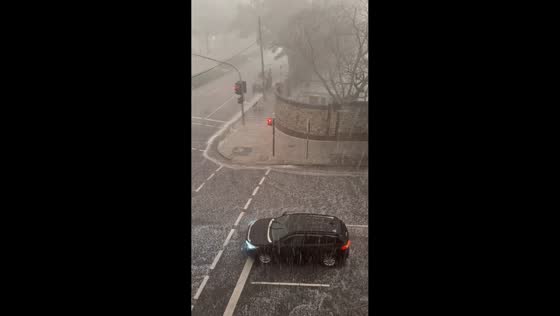 Severe hailstorm and downpour flood streets across in Sydney, Australia