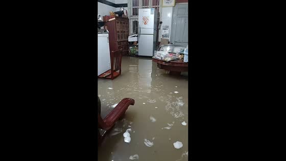 Deep floodwater engulfs ground floor of home in Zhejiang, China