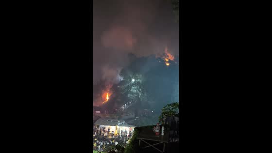 Hillside fire erupts during drone fireworks show in Liuyang, Hunan, China