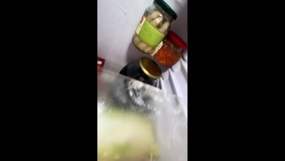 Glass jars hilariously stuck in fridge shelf in Novosibirsk, Russia