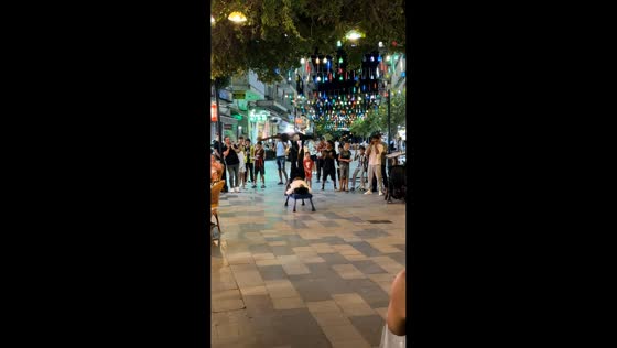Street performers amaze crowd with acrobatic act in Kusadasi, Turkey