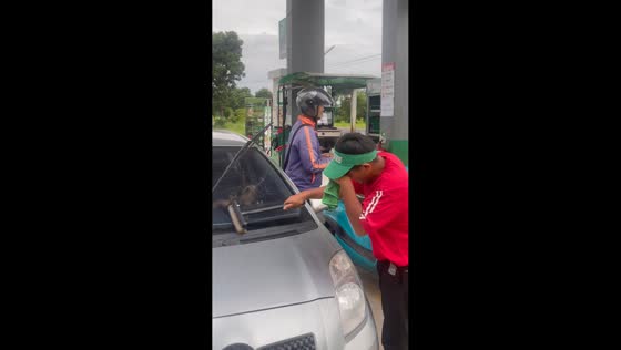 Dog barks nonstop during gas station car cleaning in Lam Plai Mat, Thailand