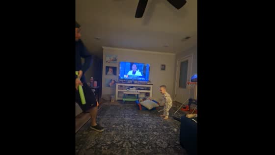 Dad accidentally hits son while playing ball in living room