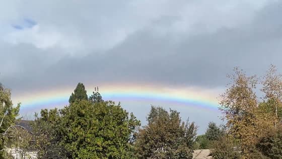 Vivid full rainbow after storm in Thousand Oaks, California, USA