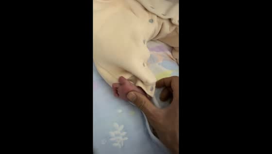 Adorable baby reacts to foot tickles in Guangdong, China