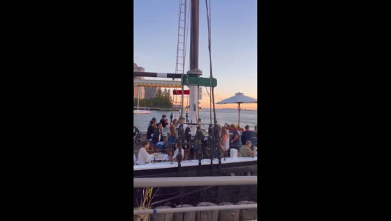 Sunrise dining at Pier 25 with Hudson River views in New York, USA