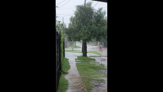 Rainy day joy: embracing childhood bliss